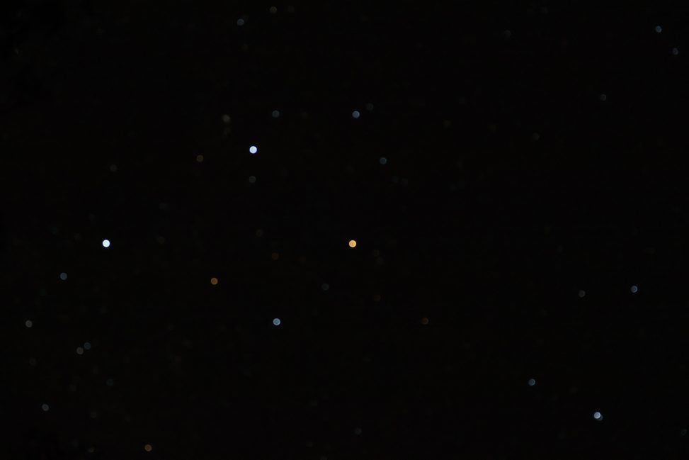 photo of night sky showing stars and planets